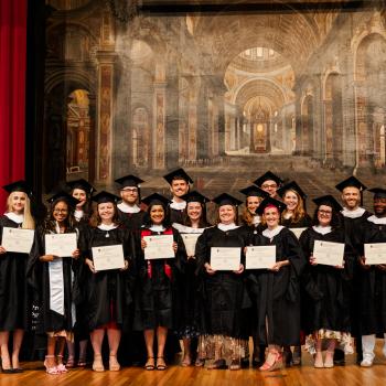 IOMP Group Photo on Stage
