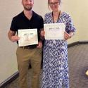 Nate and Leigha pose with certificates